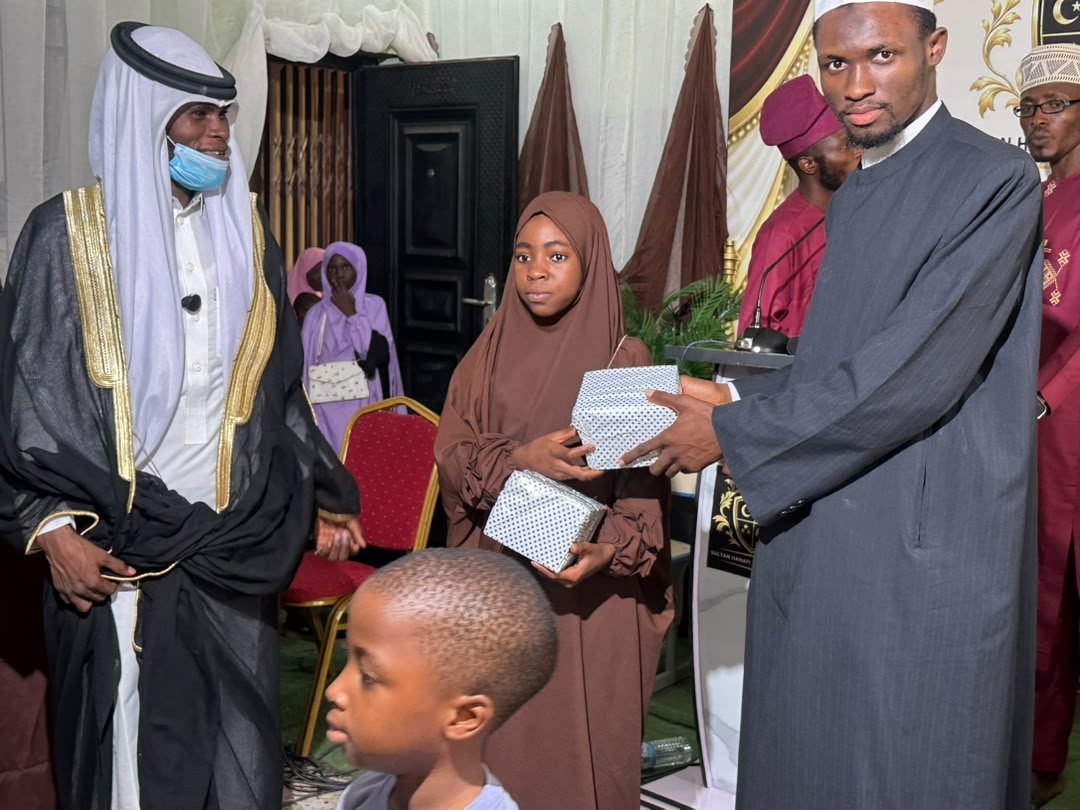 Prizes presented to a Hifz graduand before the assembled faculty and guests
