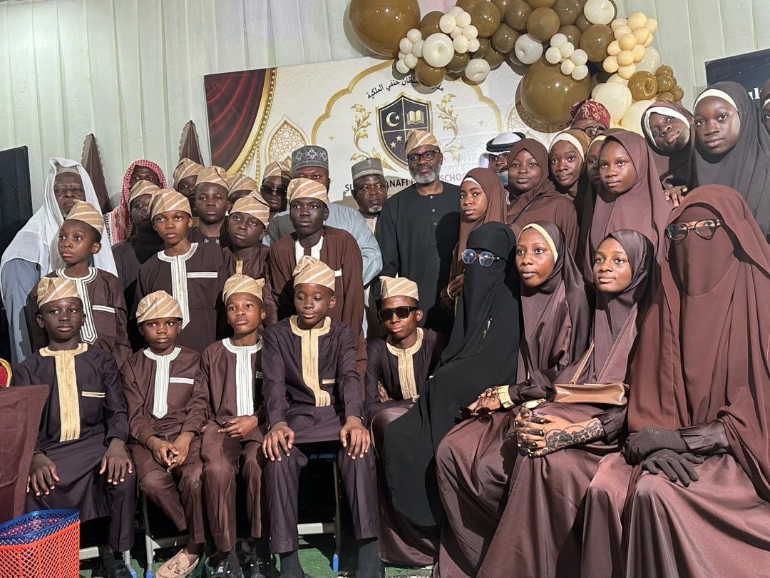 The graduating cohort of Sultan Hanafi Qur'an College with the faculty and visiting scholars standing among them