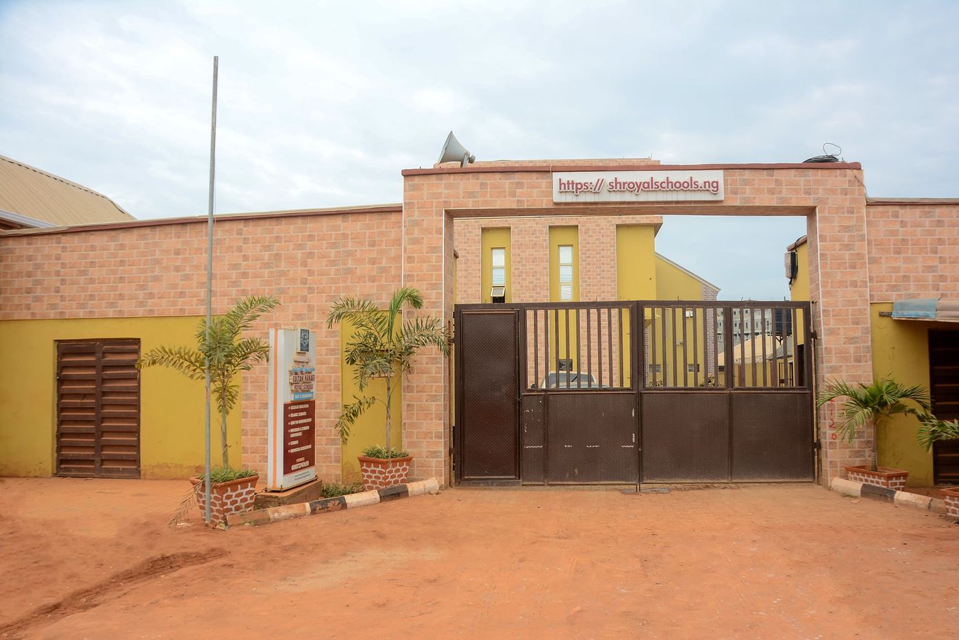 The main gate and boundary wall of Sultan Hanafi Royal Schools, Ikorodu, Lagos
